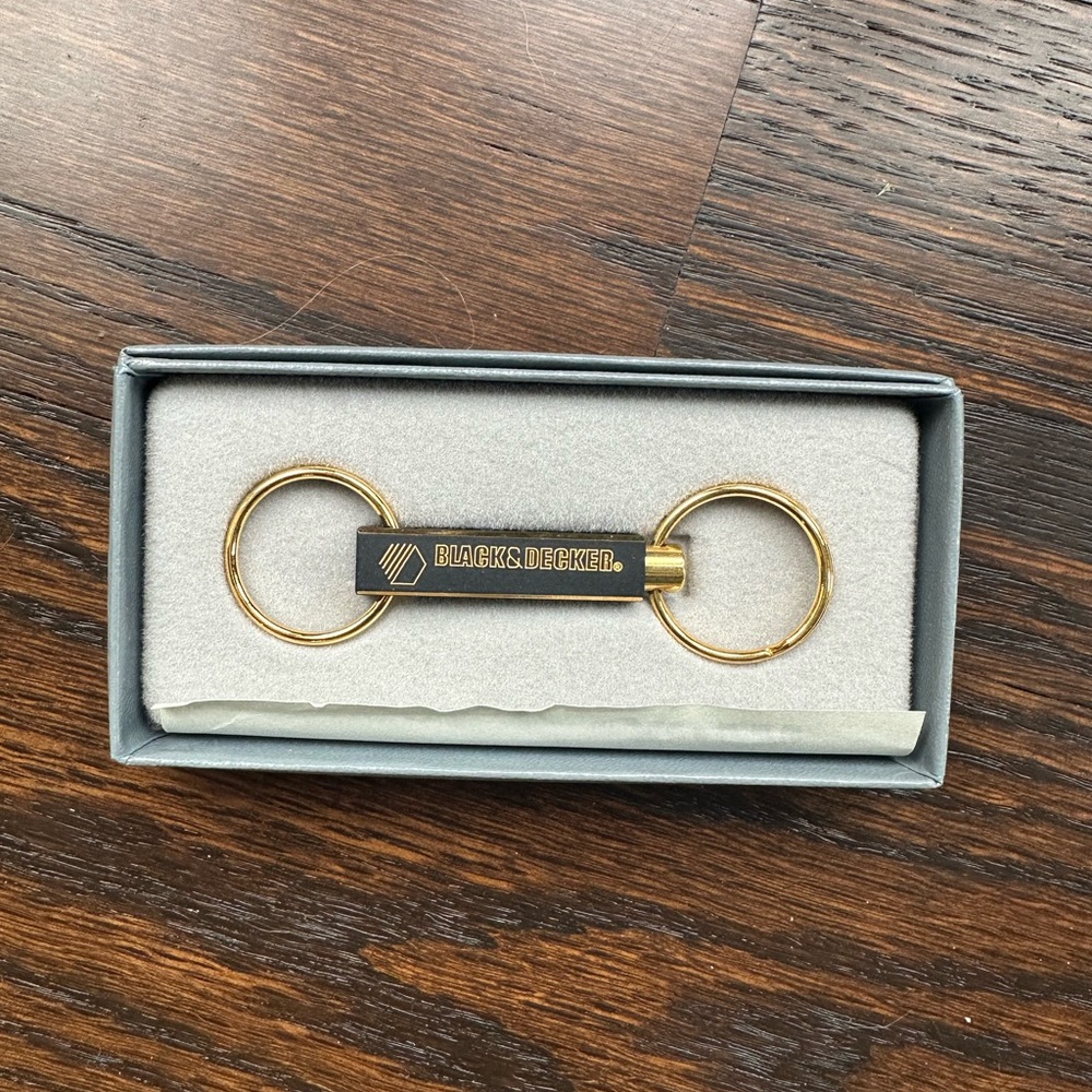 Vintage Gold-tone two-section keychain with the "BLACK&DECKER" logo